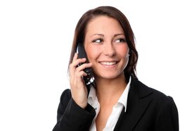 Geschäftsfrau mit Telefon. Foto: Konstantin Gastmann/Pixelio.de
