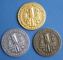 Lambertussiegel in den Stufen Bronze, Silber und Gold. Foto: Stadt Oldenburg Lambertussiegel in den Stufen Bronze, Silber und Gold. Foto: Stadt Oldenburg