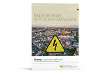 Die Titelseite des „Oldenburger Wirtschaftsmagazins 3.22“ zeigt eine Luftaufnahme der Oldenburger Innenstadt mit Blickrichtung Hafen sowie ein gelbes Dreieck mit schwarzem Blitz als Symbol für die Energiekrise. Foto: Markus Löchte